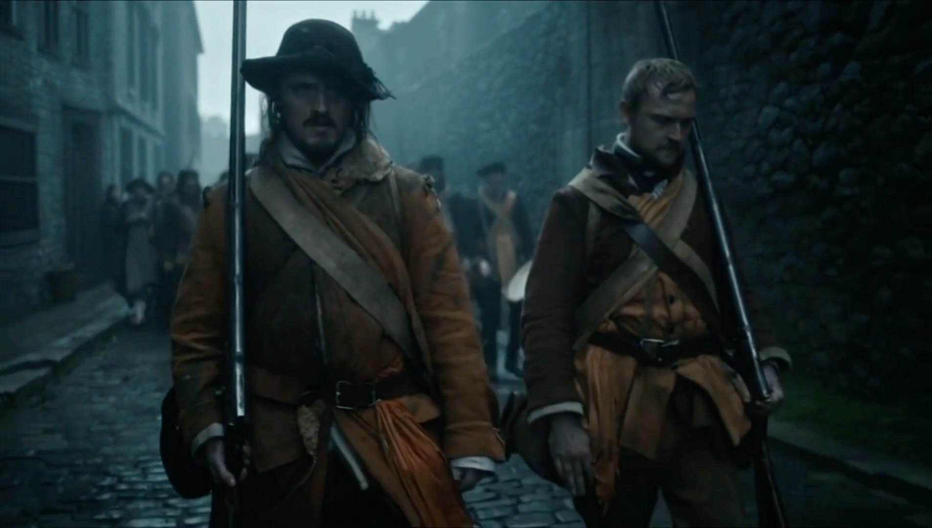 Ash and Iron: two soldiers walking through a misty stone street